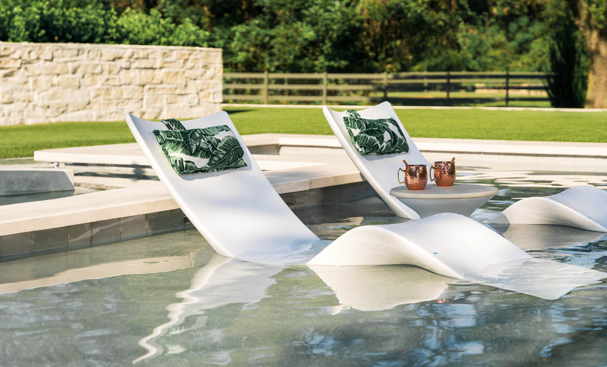 Autograph Chaise poolside lifestyle photo